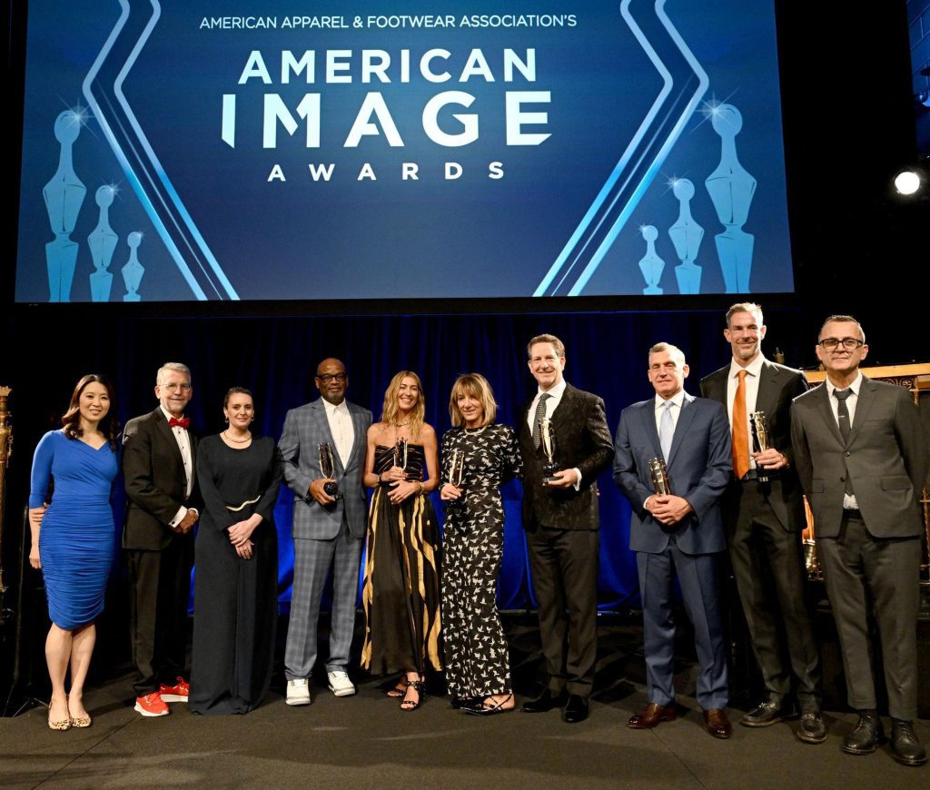 The 2025 AAFA American Image Awards honoree slate (l. to r.): Scarlet Fu, emcee, Steve Lamar of AAFA, Laura Weber of LW Pearl, Dr. D'Wayne Edwards of the Pensole Lewis College, Ulla Johnson, Katherine Gold of GoldBug, Bill Foudy of Target, Lance Ruttenberg of American Textiles, Lewis Perkins of the Apparel Impact Institute (Aii), and Steven Kolb of CFDA